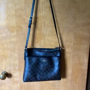This is a gently used coach swing pack bag